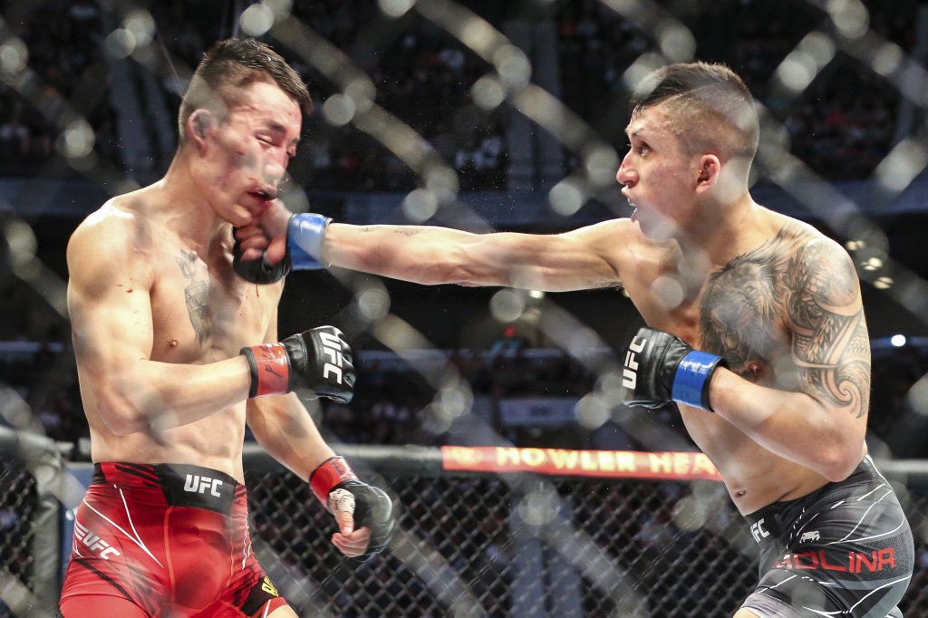 KC based MMA fighters share embrace after Jeff Molina